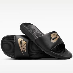 Nike Women's Black and Gold Slide Sandals